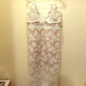 Midi white dress with lace overlay